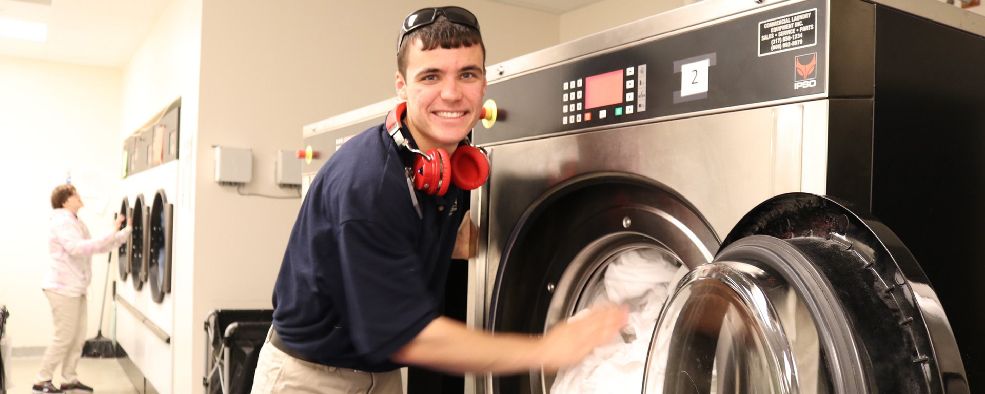 man doing laundry